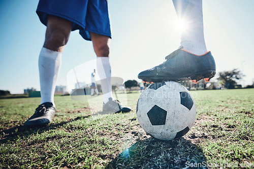 Image of Legs, soccer and ball with players ready for kickoff on a sports field during a competitive game closeup. Football, fitness and teamwork on grass with a team standing in boots to start of a match