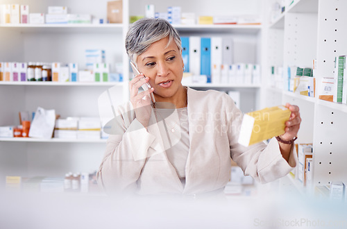 Image of Phone call, woman in pharmacy with box of medicine, consulting for healthcare product information. Telehealth, pharmaceutical advice and senior person with decision, choice and cellphone consultation