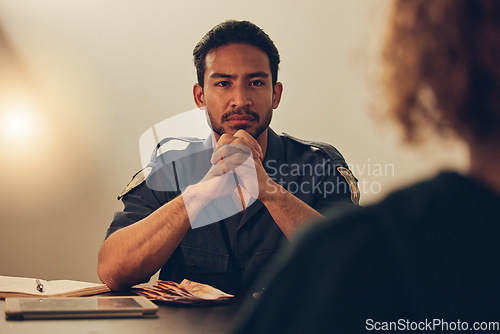 Image of Police, investigation and man listening to woman for report, interrogation or criminal arrest. Law, crime and bribery, detective at station for money laundering interview, questions and attention.