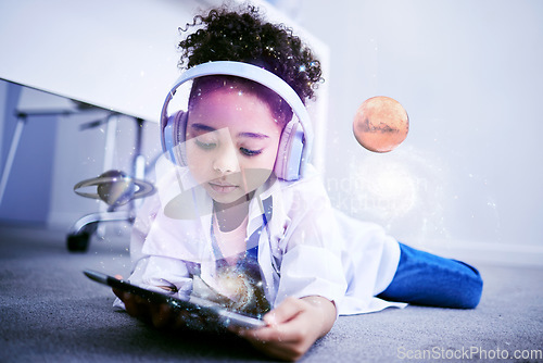 Image of Child, science and astronomy on tablet with web education and internet app for kids. Home, child and digital holograph of space and planets with headphones listening to children research podcast