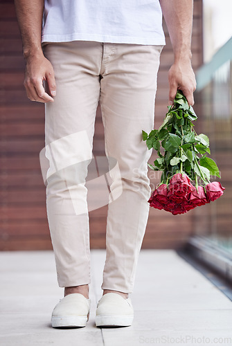 Image of Hands, legs and man with bouquet of roses for date, romance and hope for valentines day. Love confession, romantic floral gift and person holding flowers, standing outside for proposal or engagement