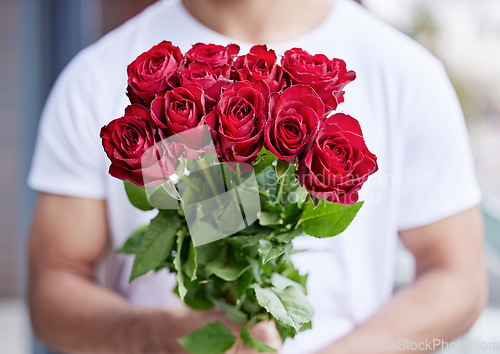 Image of Love, romance and man with bouquet of roses for date, care for valentines day and gratitude. Romantic surprise, floral gift and person giving red flowers standing outside for proposal or engagement