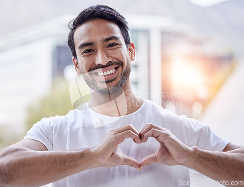 Image of Portrait, smile and Asian man with heart sign, support and review with romance, loving and social media. Face, male person and guy with symbol for love, casual or romantic shape with feedback or care