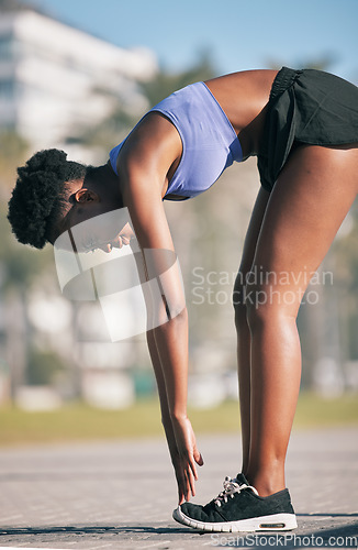 Image of Profile, fitness and stretching with a black woman runner outdoor for body wellness, cardio or endurance training. Exercise, health or running with a young sports person getting ready to workout