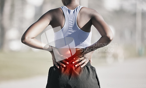 Image of Runner woman, back pain and street with hands, emergency and problem with spine, muscle and training. Girl, running injury and accident with red glow on skin at workout, outdoor exercise and fitness