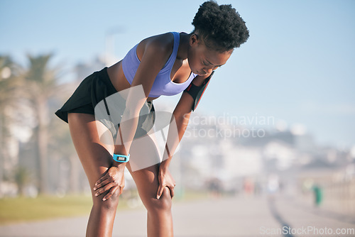 Image of Black woman, tired and breathing for sports training, exercise break or workout challenge in city. Young female athlete, rest and breath from fitness, outdoor running and fatigue of cardio marathon