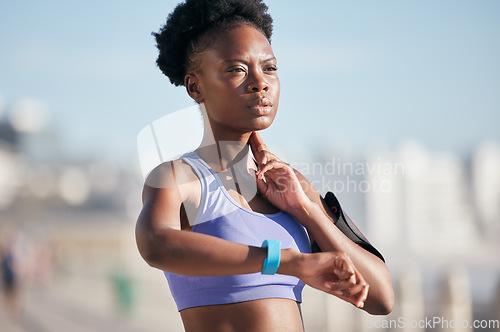 Image of Sports, workout and woman checking pulse for body wellness with smartwatch for running outdoor. Fitness, exercise and healthy African female athlete monitoring heart rate for cardio training for race