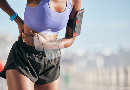 Image of Pain, injury and person doing fitness training or exercise with stomach problem and discomfort during outdoor workout. Self care, issue and athlete suffering from muscle strain or abdomen pressure