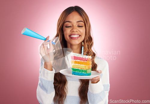 Image of Woman, birthday and rainbow cake in studio with smile, excited face and happiness by gradient background. Happy model, girl and dessert with celebration, event or achievement at party by backdrop