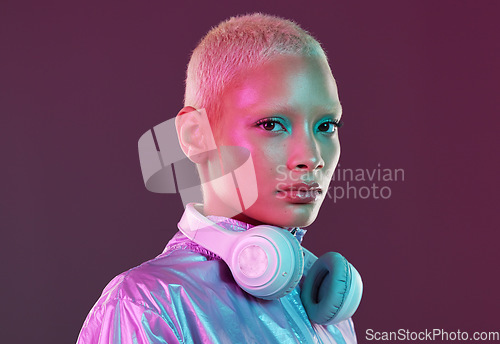 Image of Vaporwave fashion, chroma clothing and portrait of black woman with headphones in studio. Futuristic style, gen z and cosmetics of a young person isolated with cyber and technology aesthetic