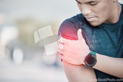 Image of Fitness, man and shoulder pain after training, exercise and guy with muscle tension, strain and ache. Arm, male and athlete with red highlight, injury and medical emergency with smartwatch and sports