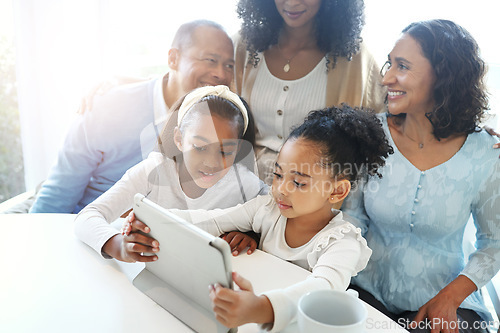 Image of Happy, smile and relax with big family and tablet for elearning, website and internet. Communication, distance learning and technology with children and grandparents for streaming and subscription