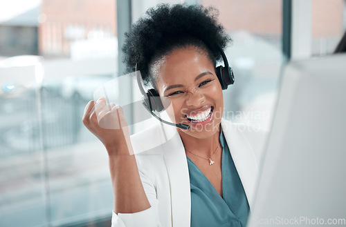 Image of Success fist, call center and woman winning, bonus and sales target in telemarketing achievement portrait. Excited, promotion and african consultant, agent or winner person with yes hand celebration