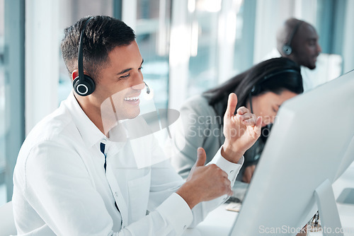 Image of Telemarketing, man and talking in office, call center and explain system, process and deadline. Male employee, agent and happy consultant with headset, customer service and tech support in workplace