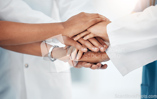 Image of Support, medical and teamwork with hands of doctors for community, collaboration and diversity. Mission, healthcare and goal with stack and group of people for motivation, medicine and solidarity