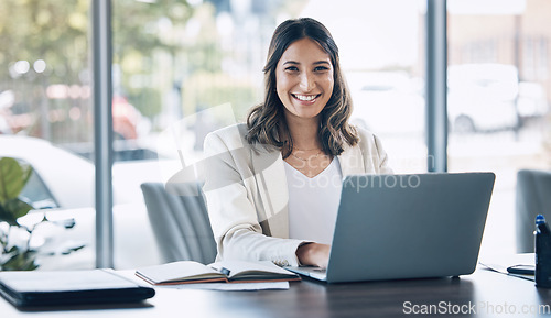 Image of Lawyer, portrait and laptop in office planning, legal consulting or policy review feedback in corporate law firm. Smile, happy and attorney woman on technology in case research or schedule management