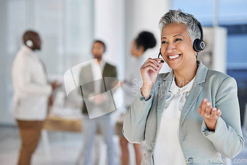 Image of Call center, happy communication and woman, consultant or agent in customer support, telemarketing and consulting. Senior business advisor, telecom person or friendly crm employee talking on headset