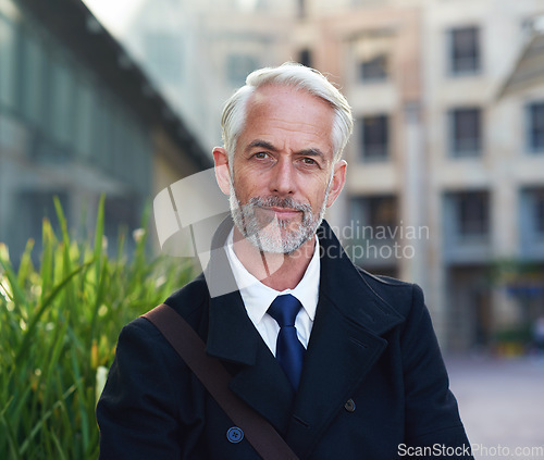 Image of Portrait, senior man and leader in city, smile and management with confidence, skills and success. Face, mature male employee and manager with corporate deal, happiness and entrepreneur outdoor