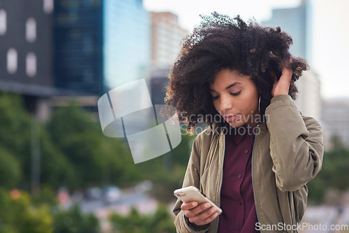 Image of Black woman, phone and city with a young person with mobile connection outdoor. Social media, networking and digital scroll of a African female with mockup and blurred background reading a text