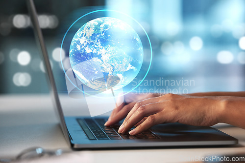 Image of Laptop, hands and Earth hologram with future technology and globe with coding and digital overlay with person typing. Futuristic, tech innovation and 3D with global network, cyber space and big data