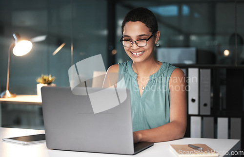 Image of Office laptop, night and black woman reading finance portfolio feedback, stock market database or ecommerce. Forex investment budget, web data analysis and happy trader trading NFT, bitcoin or crypto