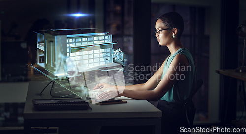 Image of Hologram, computer and business woman typing in office with 3d building at night. Futuristic, ai and female employee with holographic software for architecture, home or house with augmented reality.