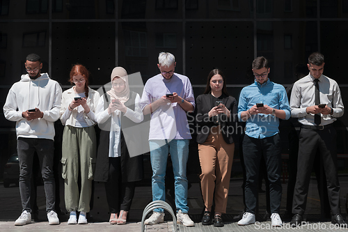 Image of A diverse and confident group of young businessmen poses together, radiating success, ambition, and unity, capturing the essence of a dynamic and inspiring business environment