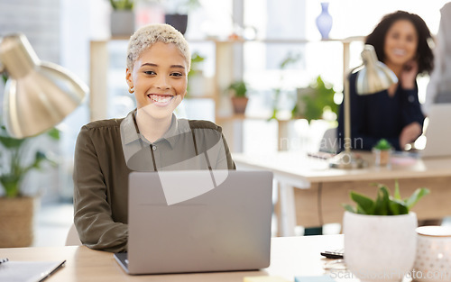 Image of Portrait of black woman working on laptop for office startup, company workflow or editing website in online business. Computer, digital management and worker, person or project manager typing at desk