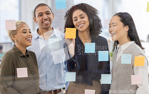 Image of Writing, collaboration and teamwork by business people in meeting for planning, idea and goal on sticky note in office. Team, schedule and diversity by group for mission, strategy or problem solving