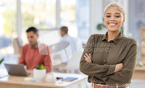 Image of Black woman in business, leadership and happy in portrait with career mindset, job goals and target in workplace. Vision, female in corporate with professional success and arms crossed in office