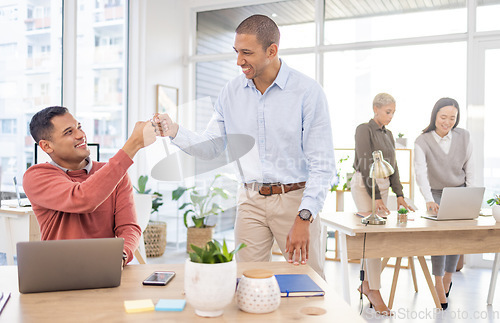 Image of Success, fist bump or happy manager in celebration of goals or sales target with worker in a digital agency. Winner, laptop or excited employee celebrates winning a bonus or business deal with smile