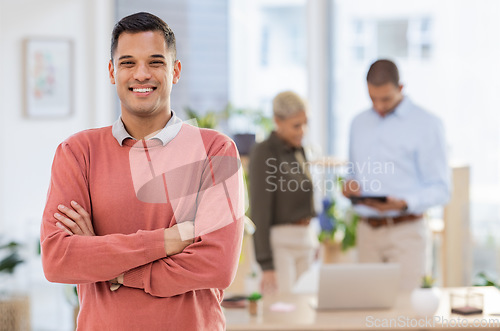 Image of Portrait, mockup and businessman or employee happy with startup company in a modern office arms crossed with smile. Person, confident and excited young male intern or worker at the workplace