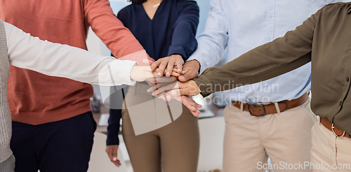 Image of Team building, mission or hands in meeting together in a business or group project for motivation. Diversity, leadership or employees in collaboration for our vision, strategy plan or target goals