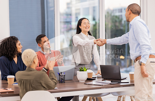 Image of B2b, Asian manager or man shaking hands in meeting or startup project partnership or business deal. Applause, handshake or happy worker talking or speaking of our vision, feedback or hiring agreement