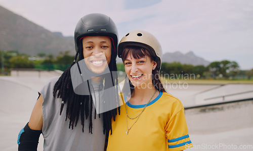 Image of Urban skate park, portrait and couple of friends with love and freedom outdoor for skating. Summer, gen z and young interracial skater people together in the sunshine ready for skateboarding