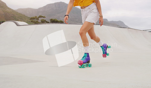 Image of Fitness, health and roller skates with shoes of woman in park for training, hobby and freedom. Summer break, sports and speed with feet of girl skating for exercise, workout and movement in outdoors