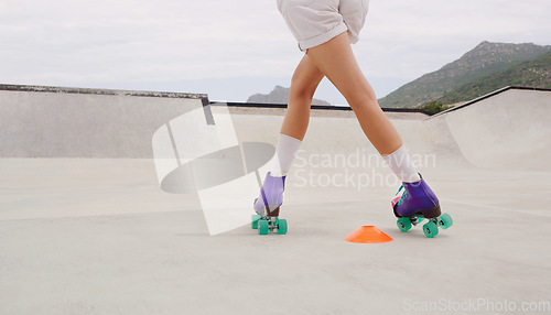 Image of Fitness, skating and roller skates with shoes of woman in skate park for training, hobby and freedom. Summer, sports and speed with girl skater and challenge course with cones for exercise or workout