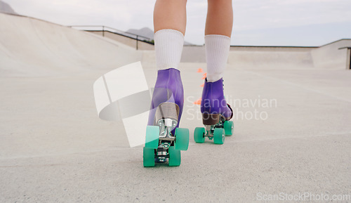 Image of Freedom, skating and roller skates with shoes of woman outdoor park for training, hobby and health. Summer, sports and speed with girl skater and challenge course with cones for exercise or workout