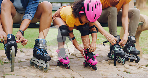 Image of Family, children or rollerblade with a girl and parents in the park together for fun or recreation. Kids, love or learning with a mother, father and daughter bonding outdoor while rollerblading