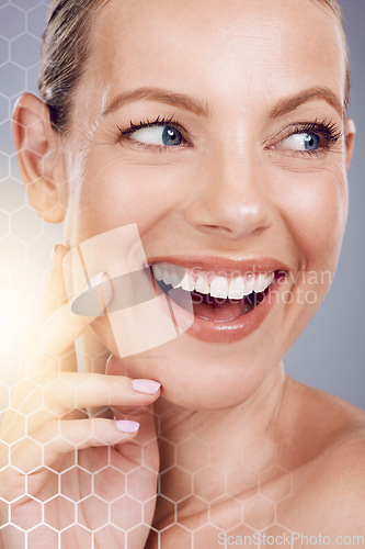 Image of Woman, studio and skincare with hologram for beauty, cosmetic wellness or smile on face by gray background. Model, holographic overlay or futuristic aesthetic for happiness, clean facial skin or glow