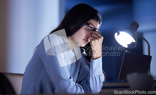 Image of Business woman at desk, headache and stress with burnout, corporate fatigue and laptop glitch. Work night, overtime and deadline problem, 404 and glasses with vision fail, overworked and frustrated