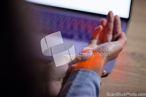 Image of Wrist injury, office and hands with pain after accident while typing on laptop in workplace. Carpal tunnel syndrome, strain and business woman with fibromyalgia, arthritis or inflammation in company.