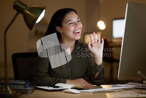 Image of Business woman, night and video call or webinar at desk in dark office for communication. Happy entrepreneur person wave hand for hello online for learning, training or virtual seminar meeting