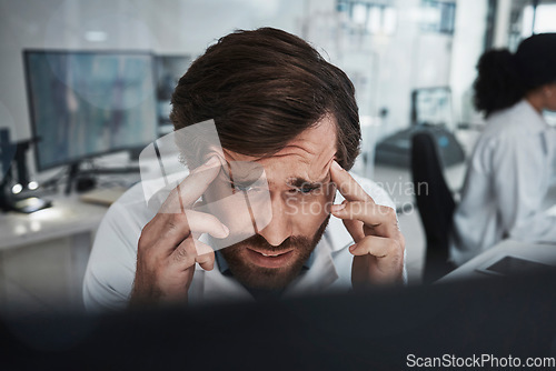 Image of Stress, research or scientist with headache or burnout in a laboratory suffering from migraine pain or overworked. Exhausted, sick or tired man working on science data frustrated with fatigue problem