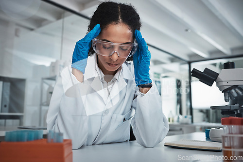 Image of Stress, woman or scientist with headache in a laboratory suffering from burnout, migraine pain or overworked. Exhausted, frustrated or tired worker working on science research with fatigue or tension