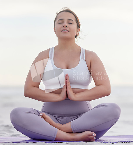 Image of Yoga meditation peace, beach and woman meditate for spiritual mental health, chakra energy balance or soul aura healing. Nature zen, freedom or pilates girl relax for mindfulness, mindset or wellness