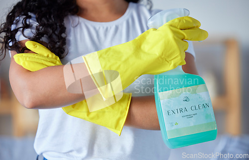 Image of Hands, latex gloves and detergent for housekeeping, cleaning or disinfection safety from bacteria at home. Hand of cleaner in healthy hygiene, protection or service for sanitize or germ removal