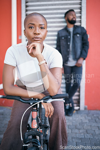 Image of Bicycle, portrait and couple of friends for city travel, streetwear fashion and urban gen z lifestyle. Face of a confident black woman or cool people with a bike in urban sidewalk for youth cycling