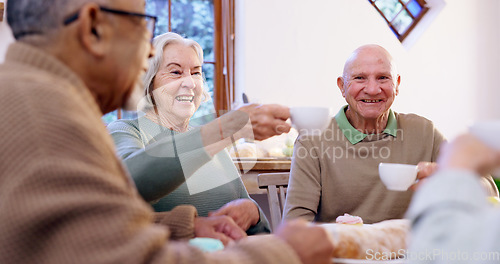 Image of Toast, tea party and a group of elderly people in the living room of a community home for a social. Friends, smile or cheers with happy senior men and women together in an apartment for a visit