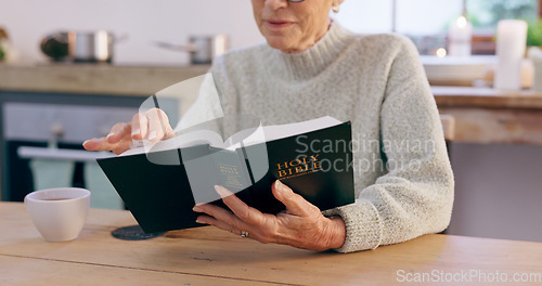 Image of Hands, bible and senior woman with reading, studying religion and gospel in home for mindfulness. Elderly person, book and peace with knowledge, gratitude or connection to God, holy spirit or faith